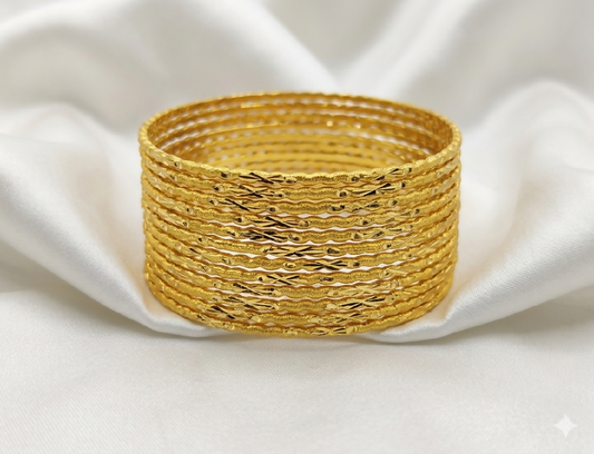 Radiant 24K Gold-Plated Wavy Bangle Set – 12-Piece Stack with Frosted Texture and Star-Burst Cuts