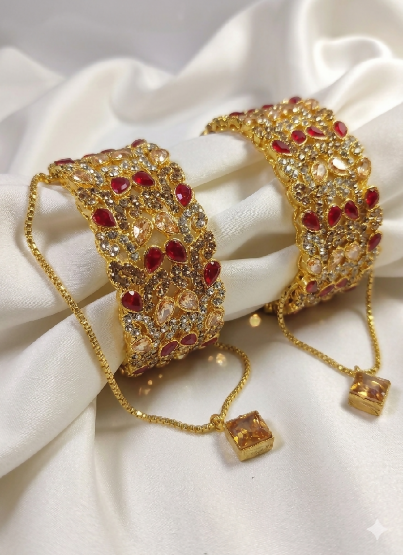 Exquisite Gold-Plated Ruby and Champagne Stone Bridal Kada Set – Hinged Statement Bangles with Filigree and Charm Detail